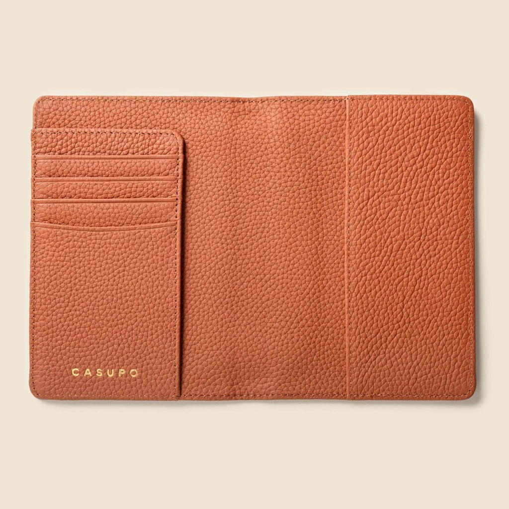 Tan leather passport wallet with RFID protection and multiple pockets for cards and cash
